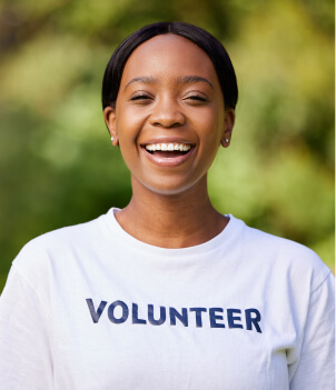 Supportive young volunteer helping a person access the right support